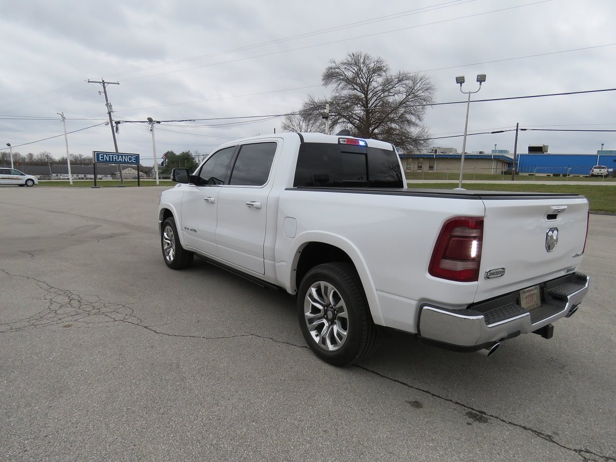 2019 Ram 1500 Laramie Longhorn with Police Upfit White Exterior Rear Picture